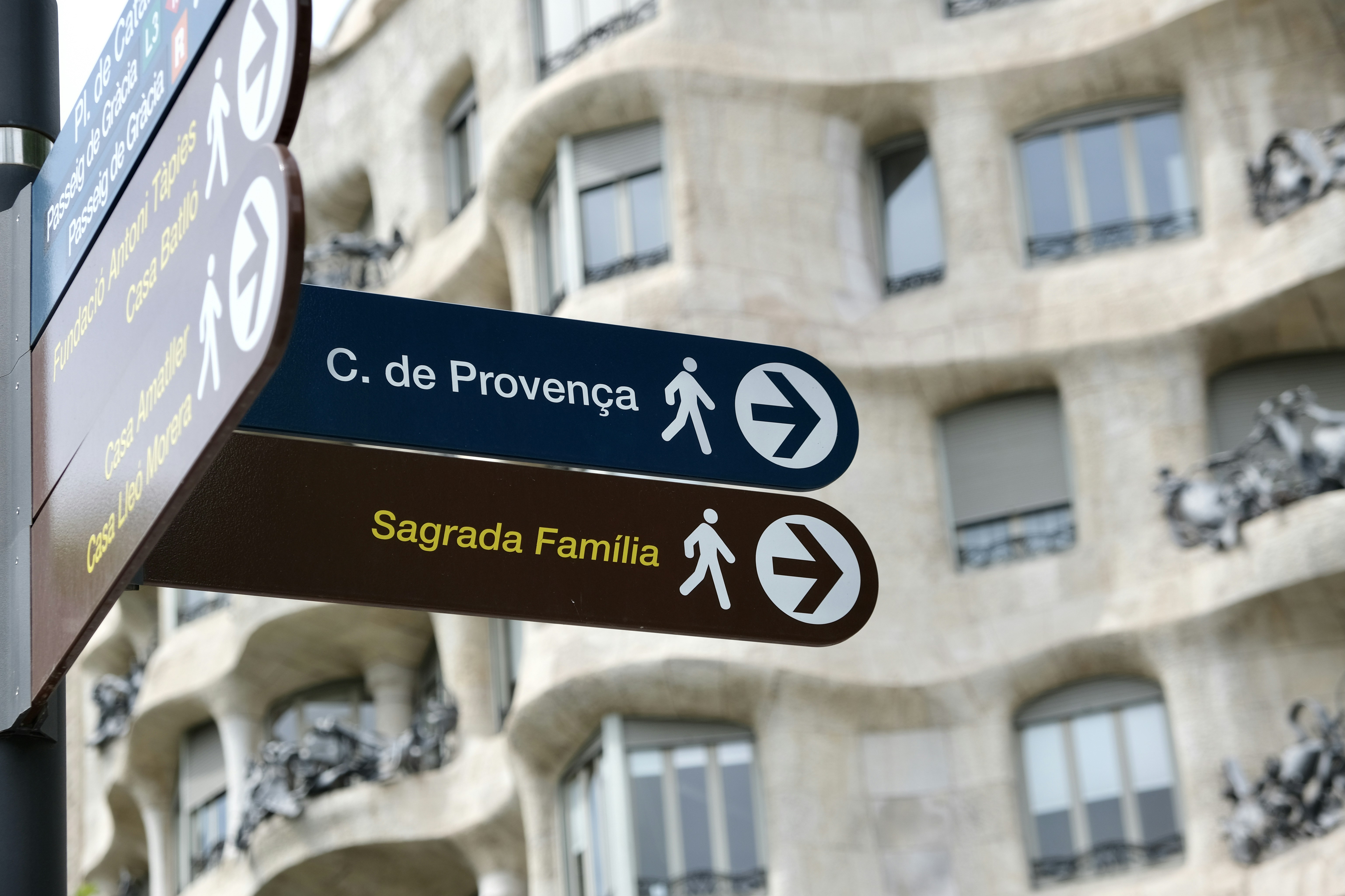 brown and white street sign, 