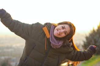woman in black jacket smiling