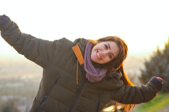 woman in black jacket smiling