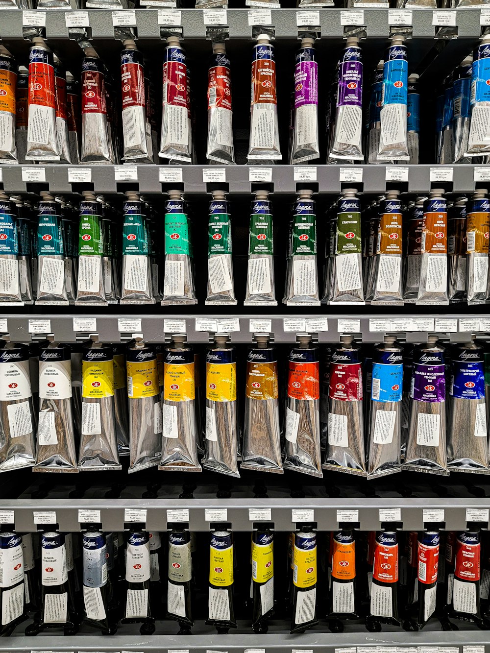 clear glass bottles on white shelf