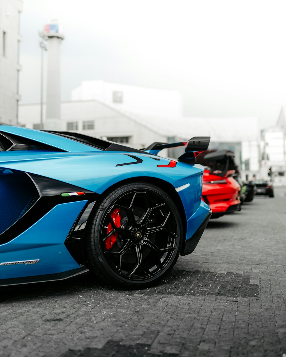 blue and red ferrari sports car