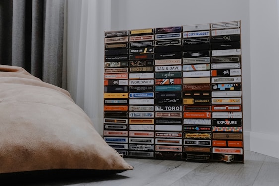 A vibrant display of trading card decks and accessories arranged on a wooden table, capturing the excitement of the game.