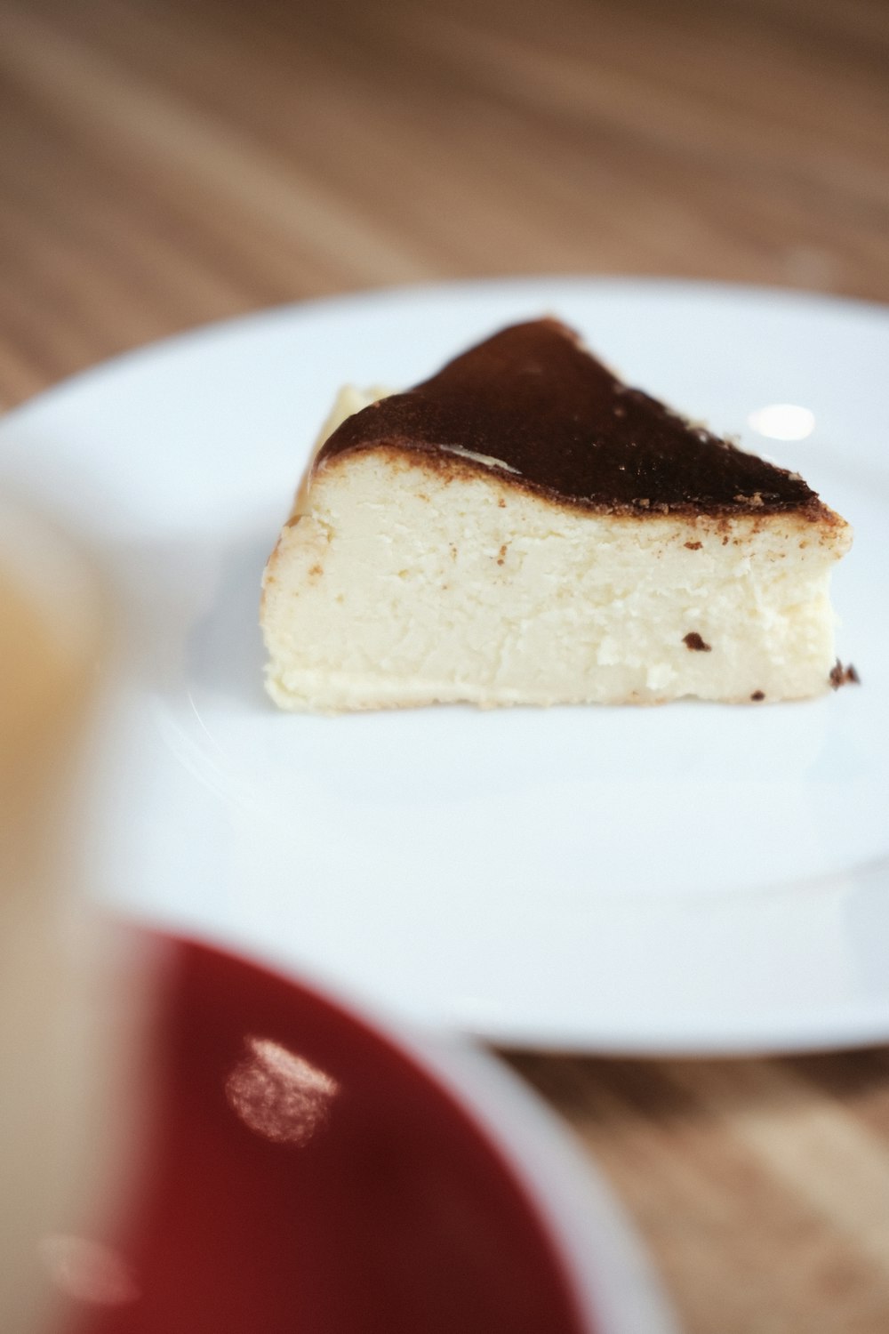 a piece of cheesecake on a white plate