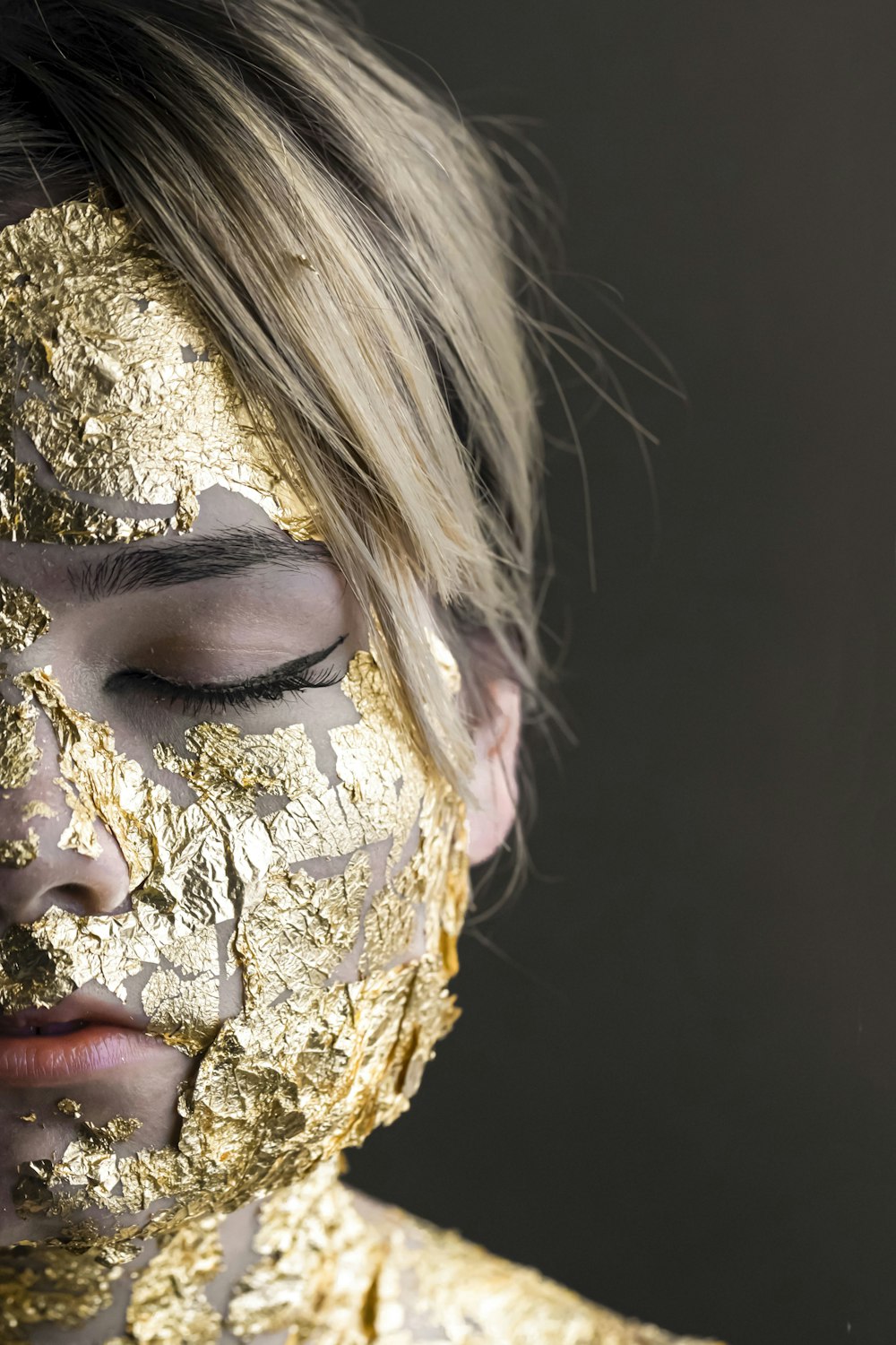 woman with white and brown face paint