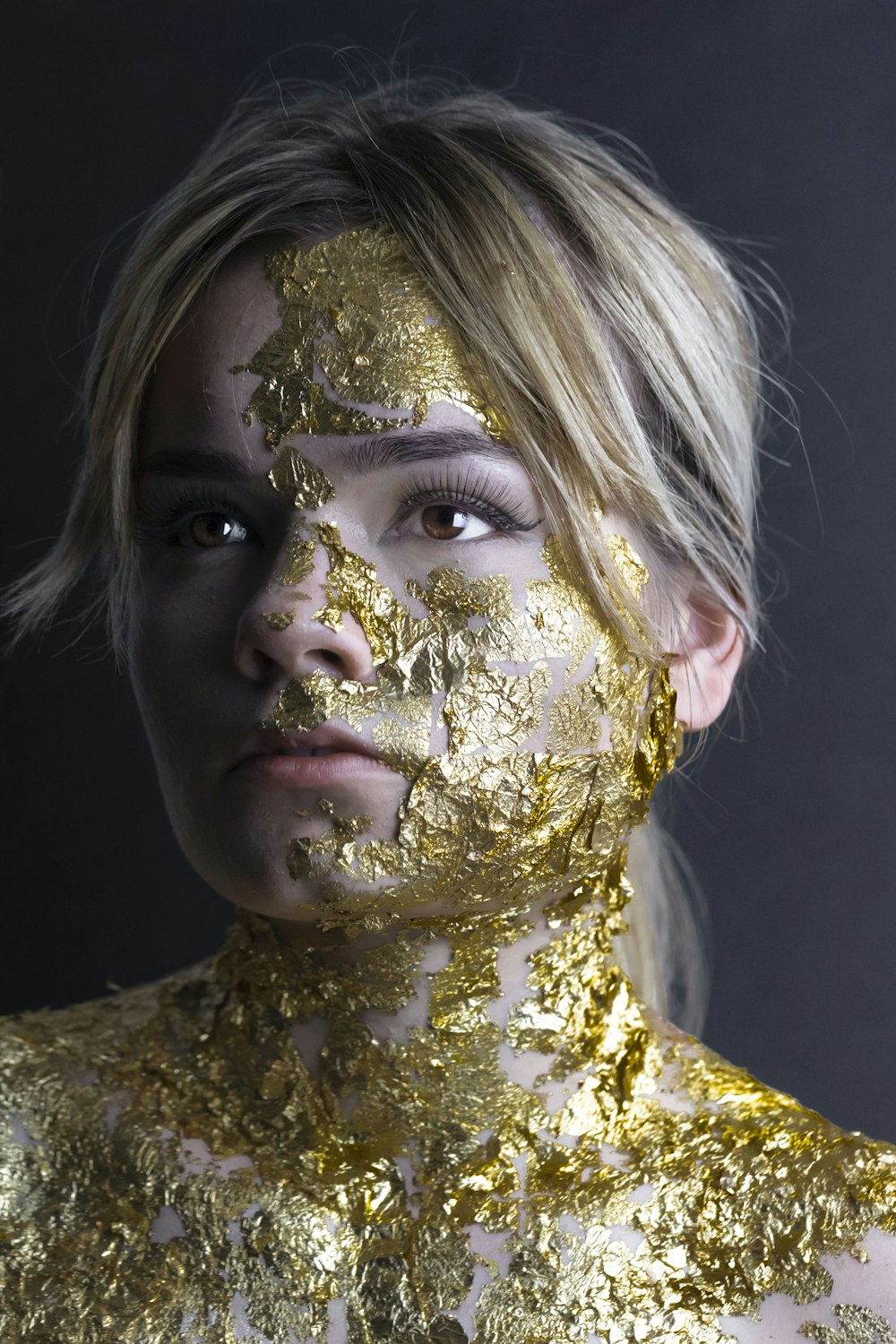 woman in gold floral head dress