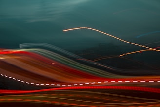 An abstract photo of light trails symbolizing data flow and technology.
