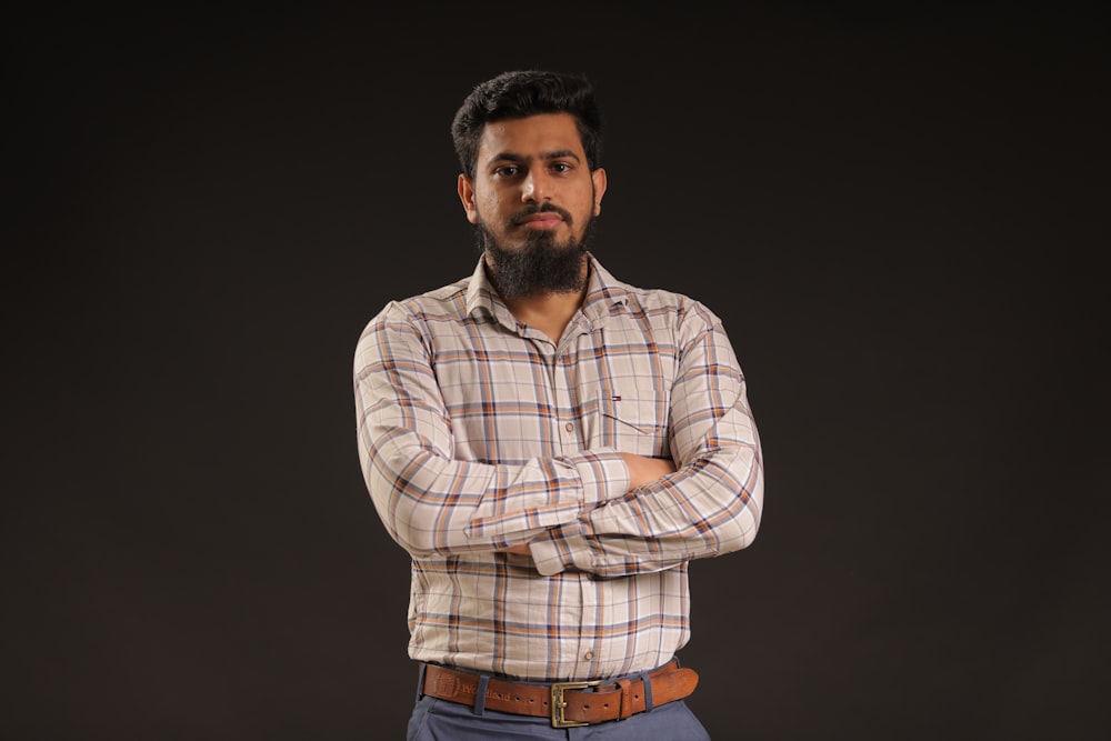 man in white and brown plaid dress shirt