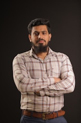 man in white and red plaid dress shirt