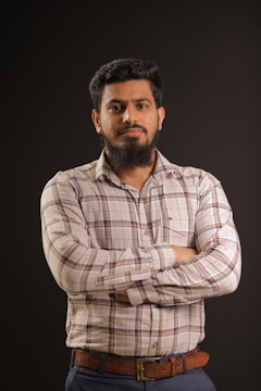 man in white and red plaid dress shirt