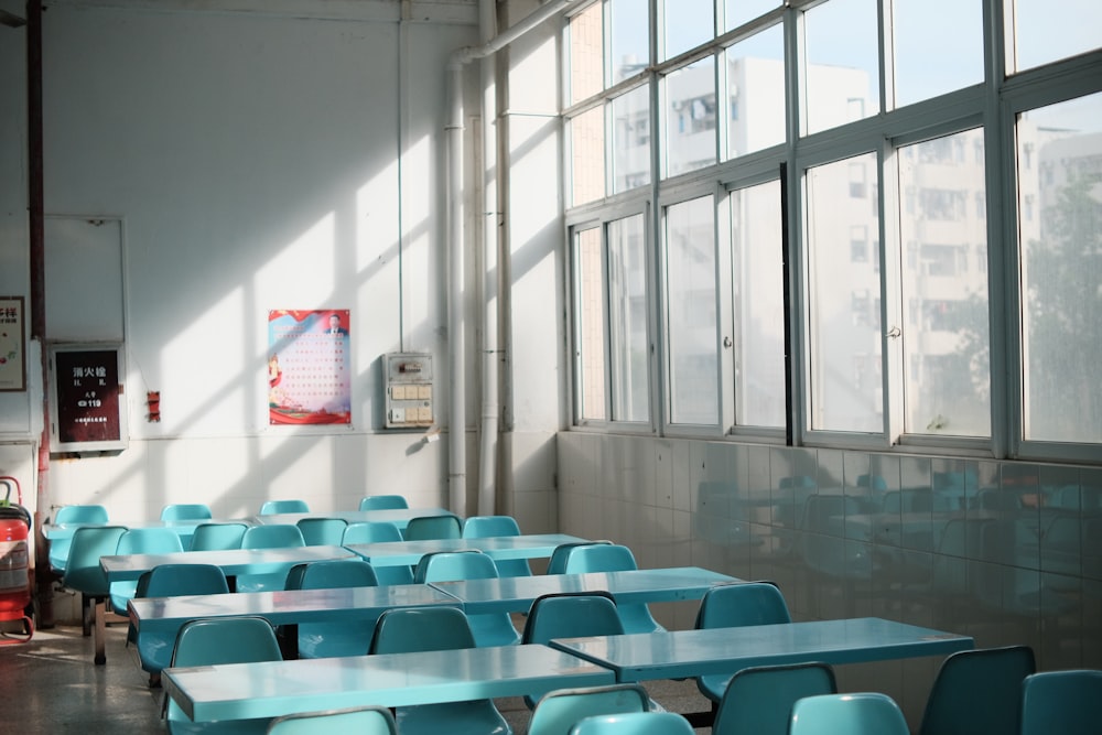 blue and gray chairs inside room