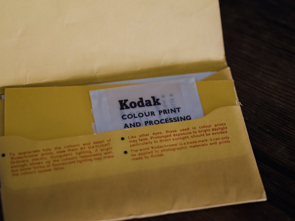 white paper envelope on brown wooden table