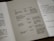 A close-up view of a printed pamphlet featuring a table with columns labeled 'Fault', 'Cause', and 'Remedy'. The table includes text about camera settings and photography issues such as exposure and focus. There is an adjacent column titled 'order form' with spaces for personal details like 'Name' and 'Number of slides'. The text is in a simple, clean font.