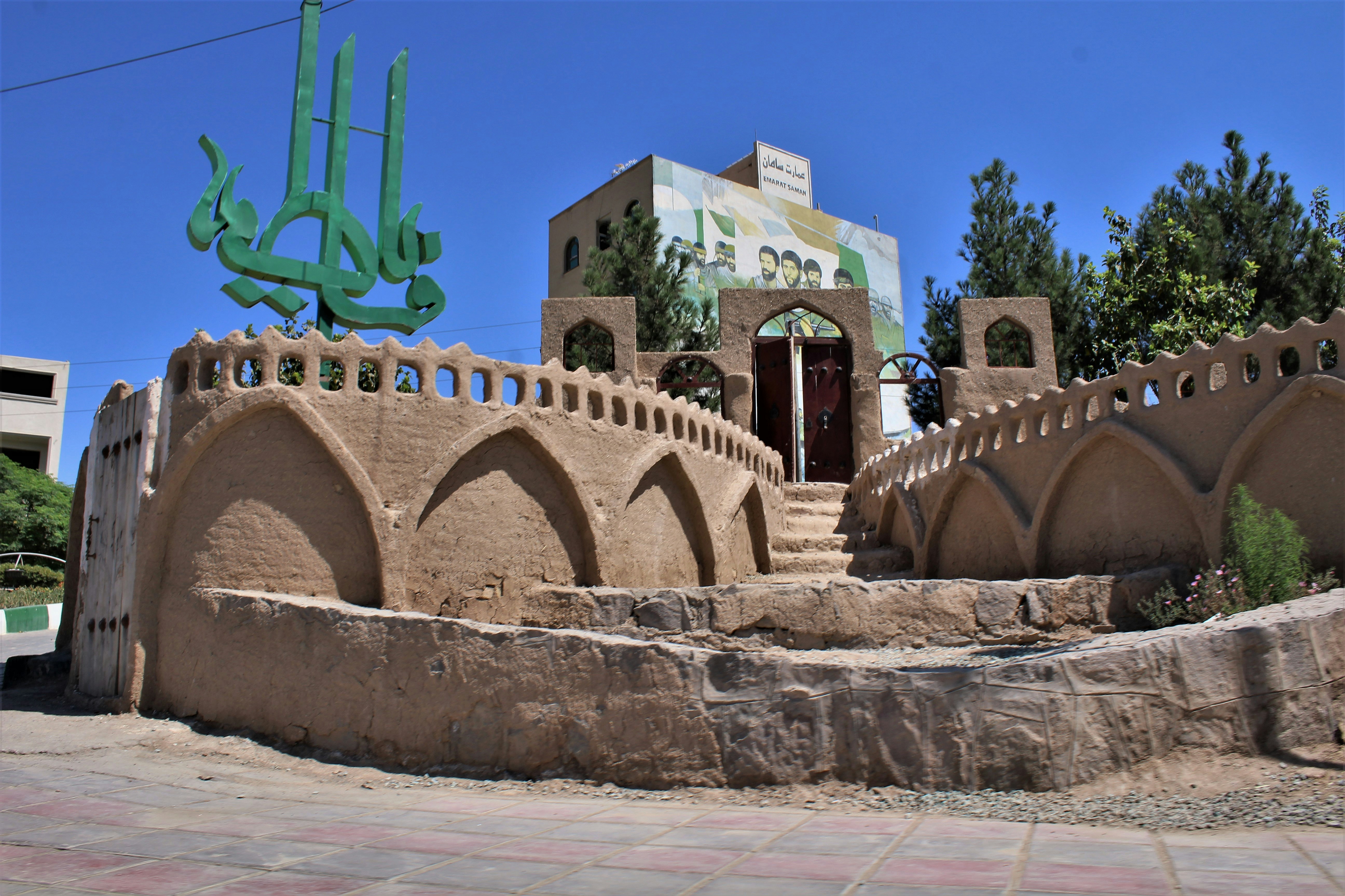 brown concrete building under blue sky during daytime