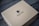 A brown cardboard box is placed on a dark wooden surface. The box features a simple design with a logo of a cup and the brand name 'CURVD' printed in black on its top surface.