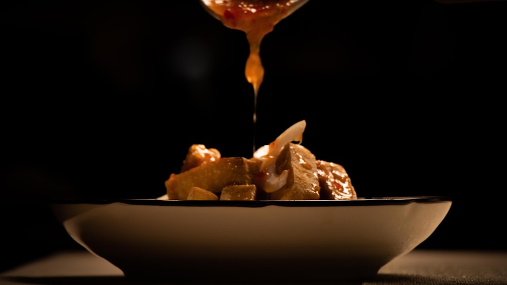 brown and white food on white ceramic plate