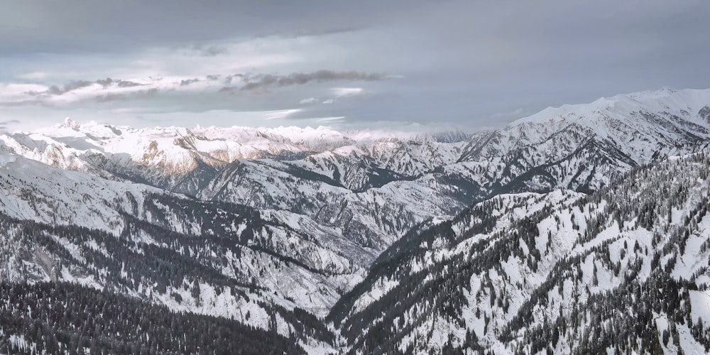 snow covered mountains during daytime