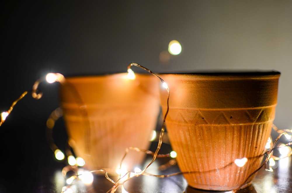 brown ceramic cup with silver wire