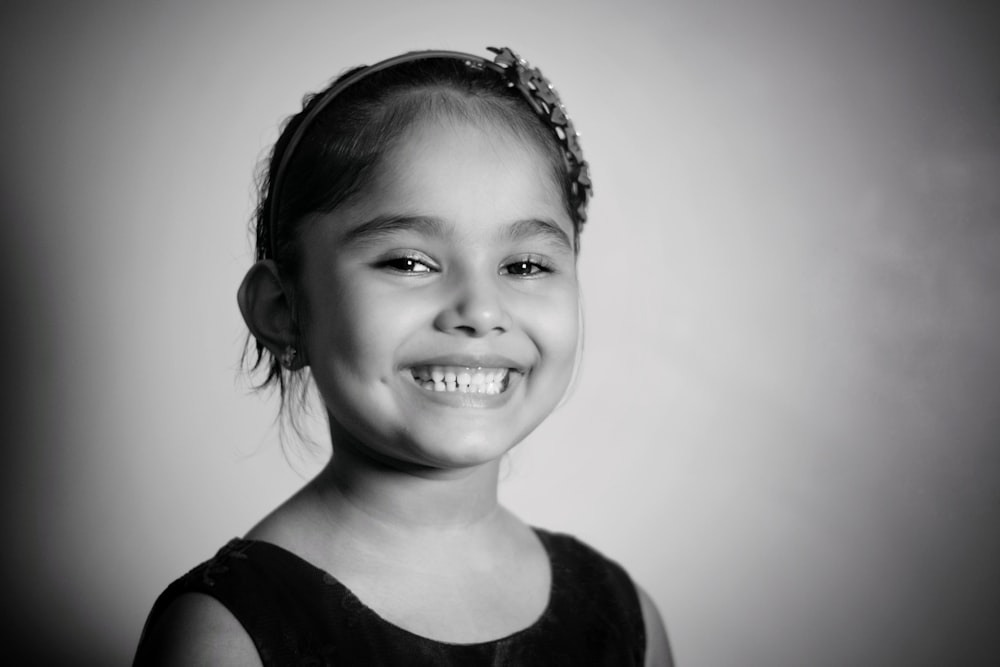 grayscale photo of girl in black tank top