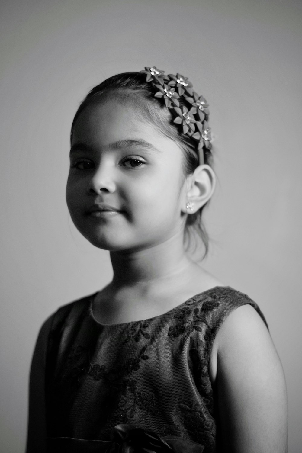 grayscale photo of girl in tank top