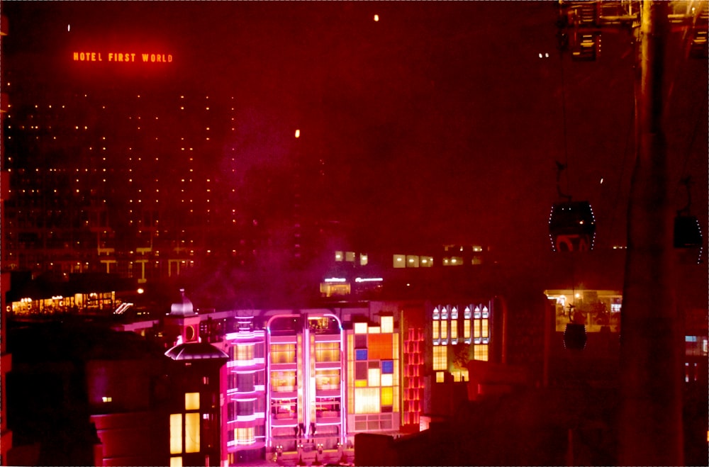 city with lights turned on during night time