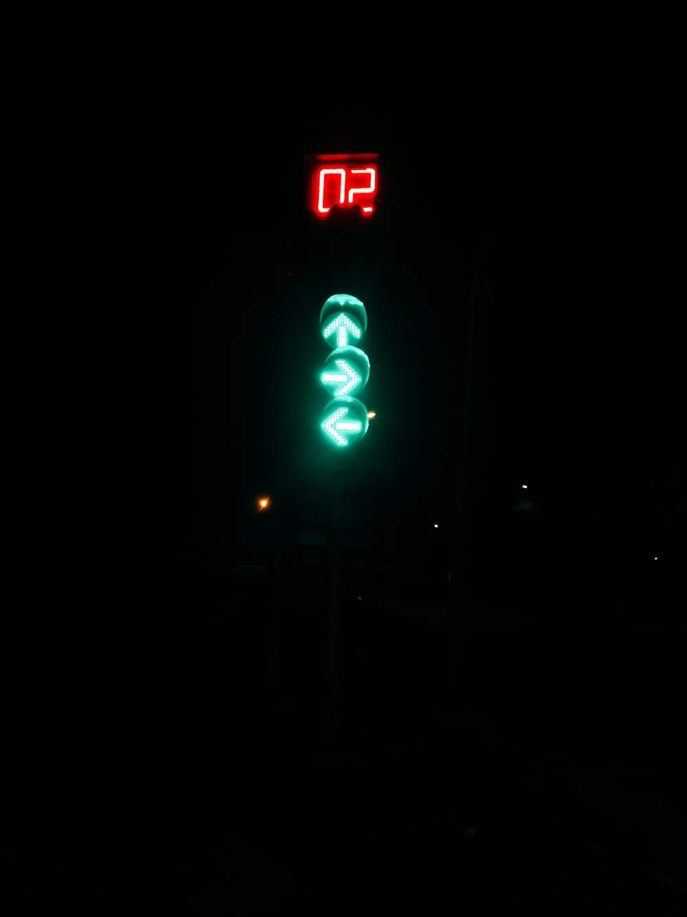 green and red stop sign