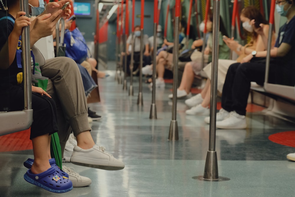 person in blue and white nike sneakers