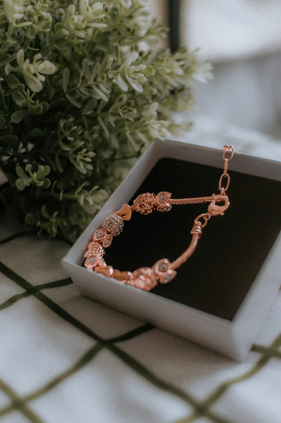 brown beaded necklace in box