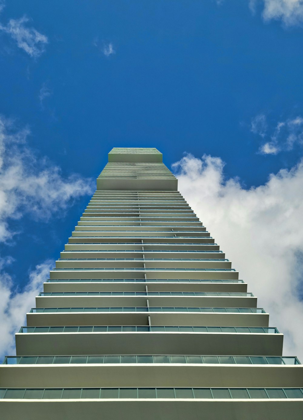 white concrete building under blue sky during daytime