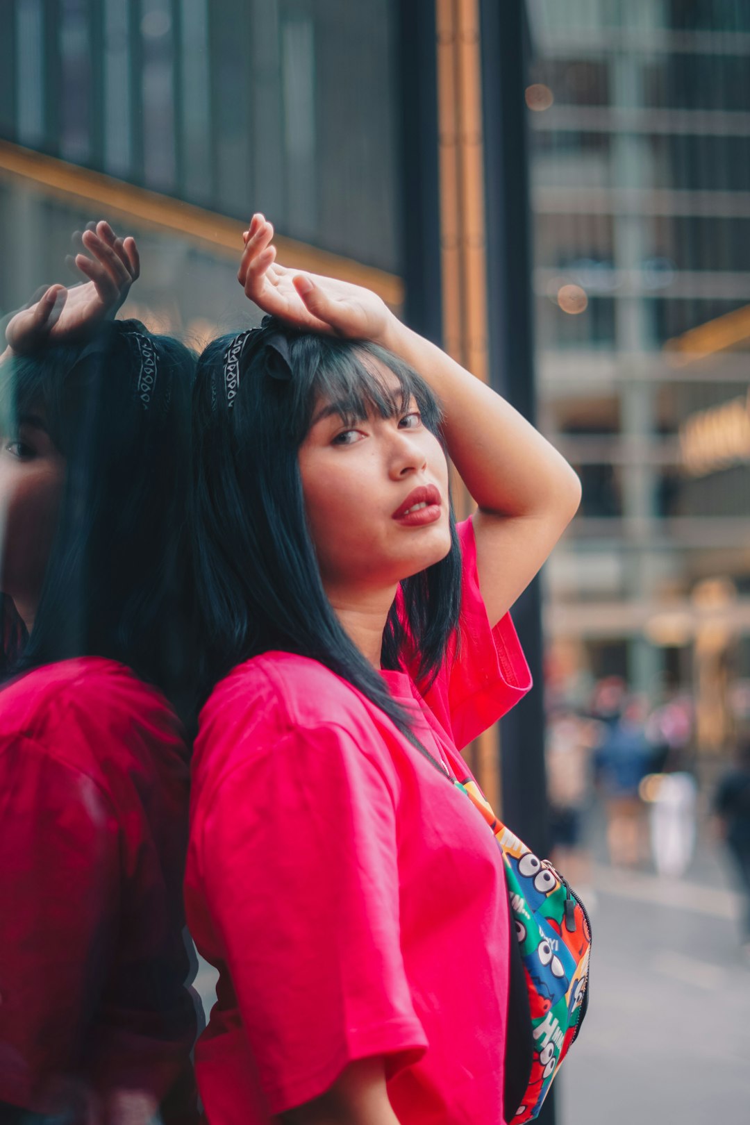 woman in red and blue shirt