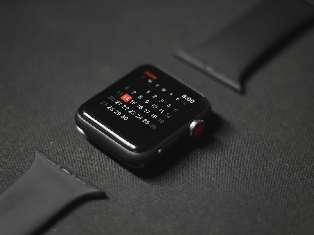 black smart watch on black surface, iWatch calendar