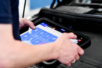 person playing game on black laptop computer