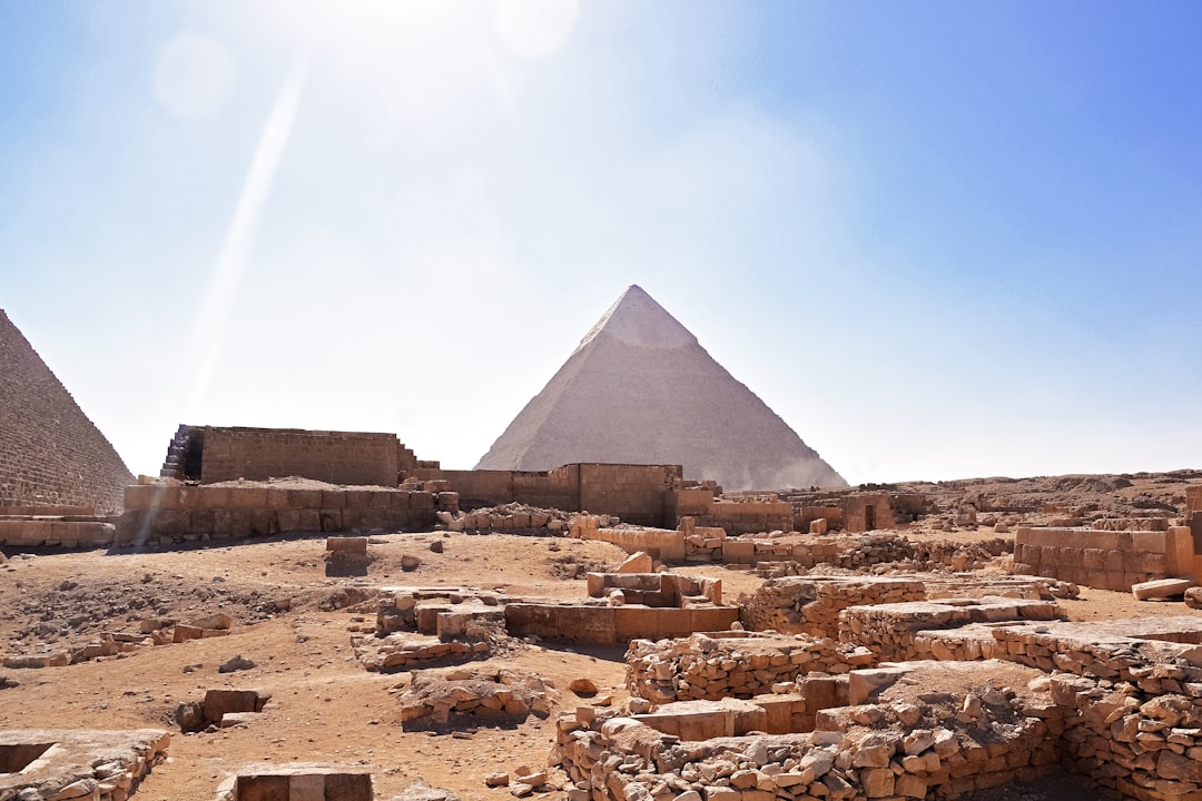 pyramid of giza under blue sky during daytime