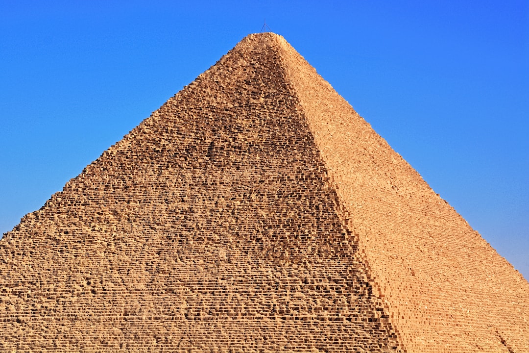 brown concrete wall under blue sky during daytime