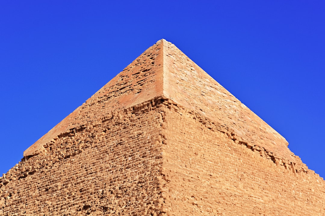 brown concrete pyramid under blue sky during daytime