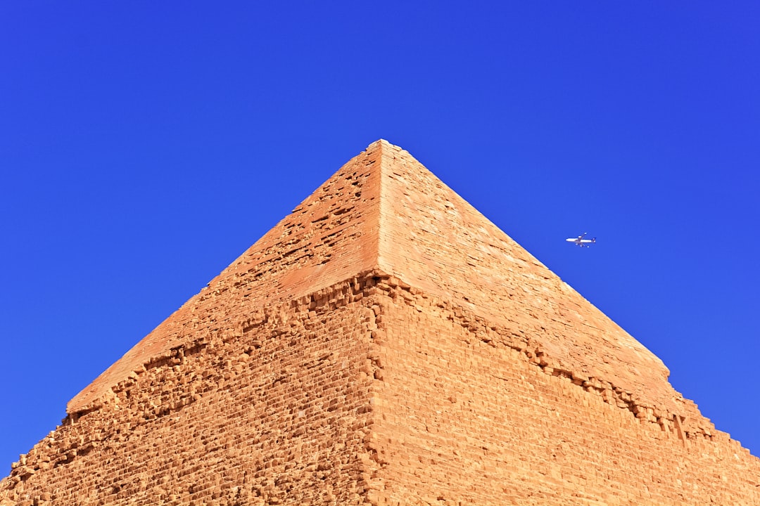 brown concrete pyramid under blue sky during daytime
