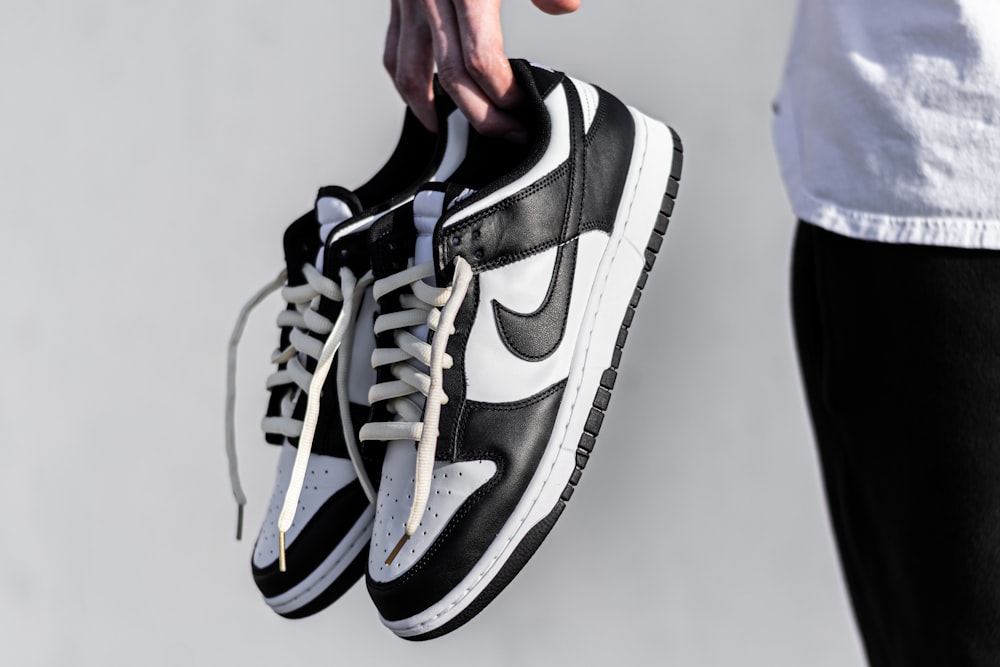 black and white nike athletic shoe