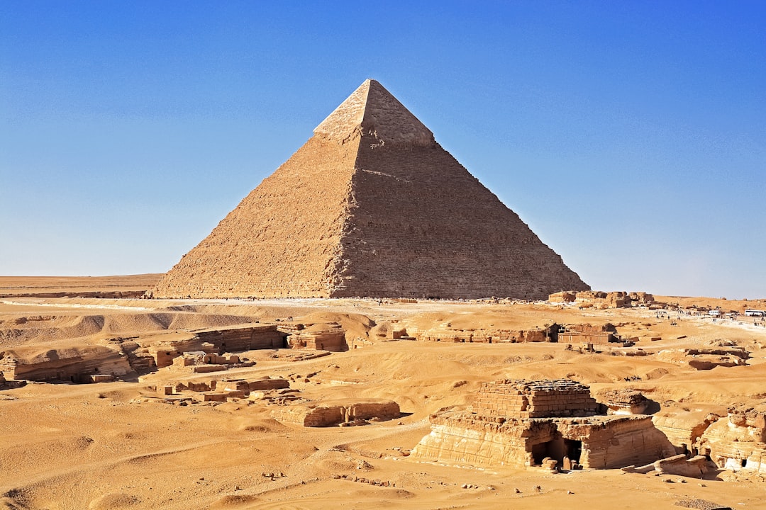 pyramid of giza under blue sky during daytime