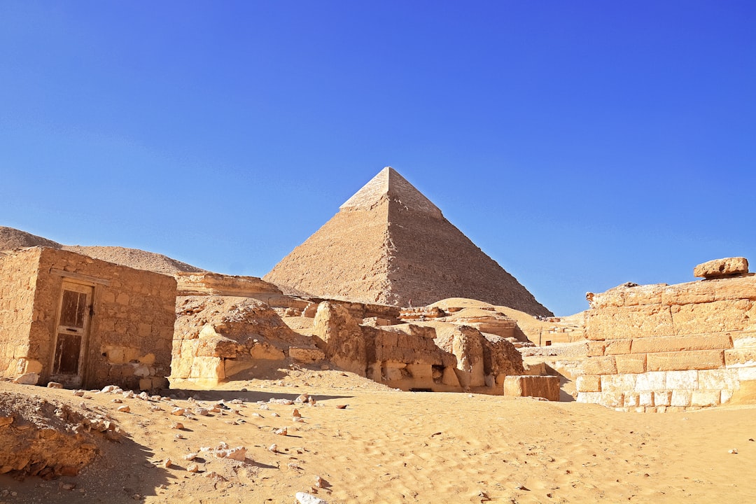 brown pyramid under blue sky during daytime