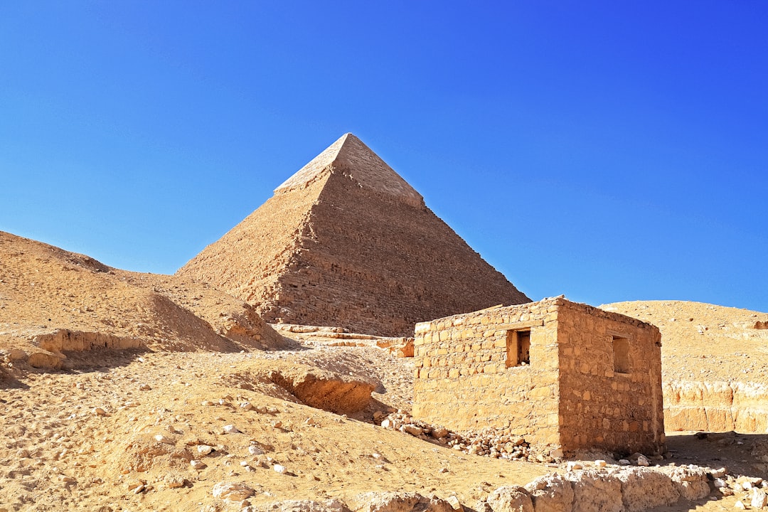 brown pyramid under blue sky during daytime