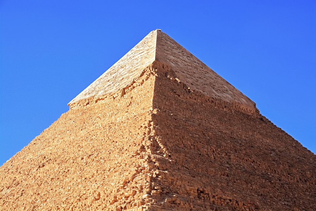 brown concrete pyramid under blue sky during daytime
