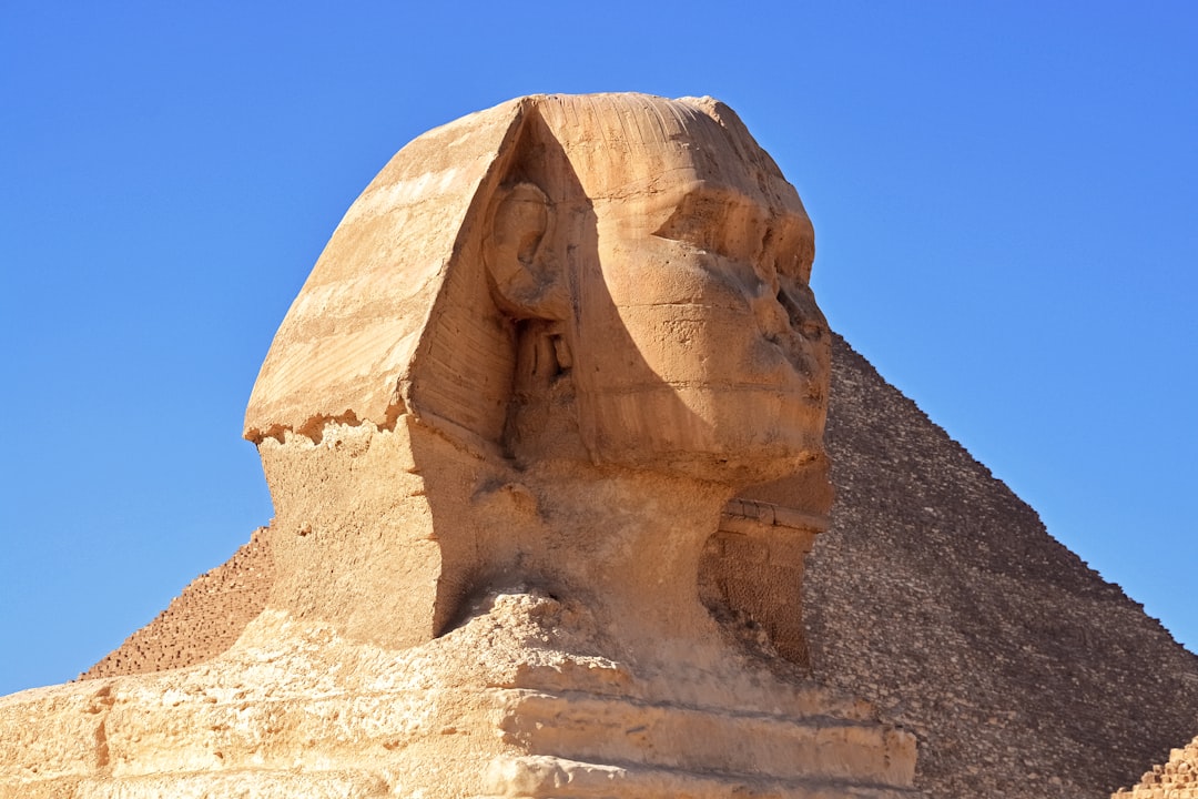 brown rock formation under blue sky during daytime