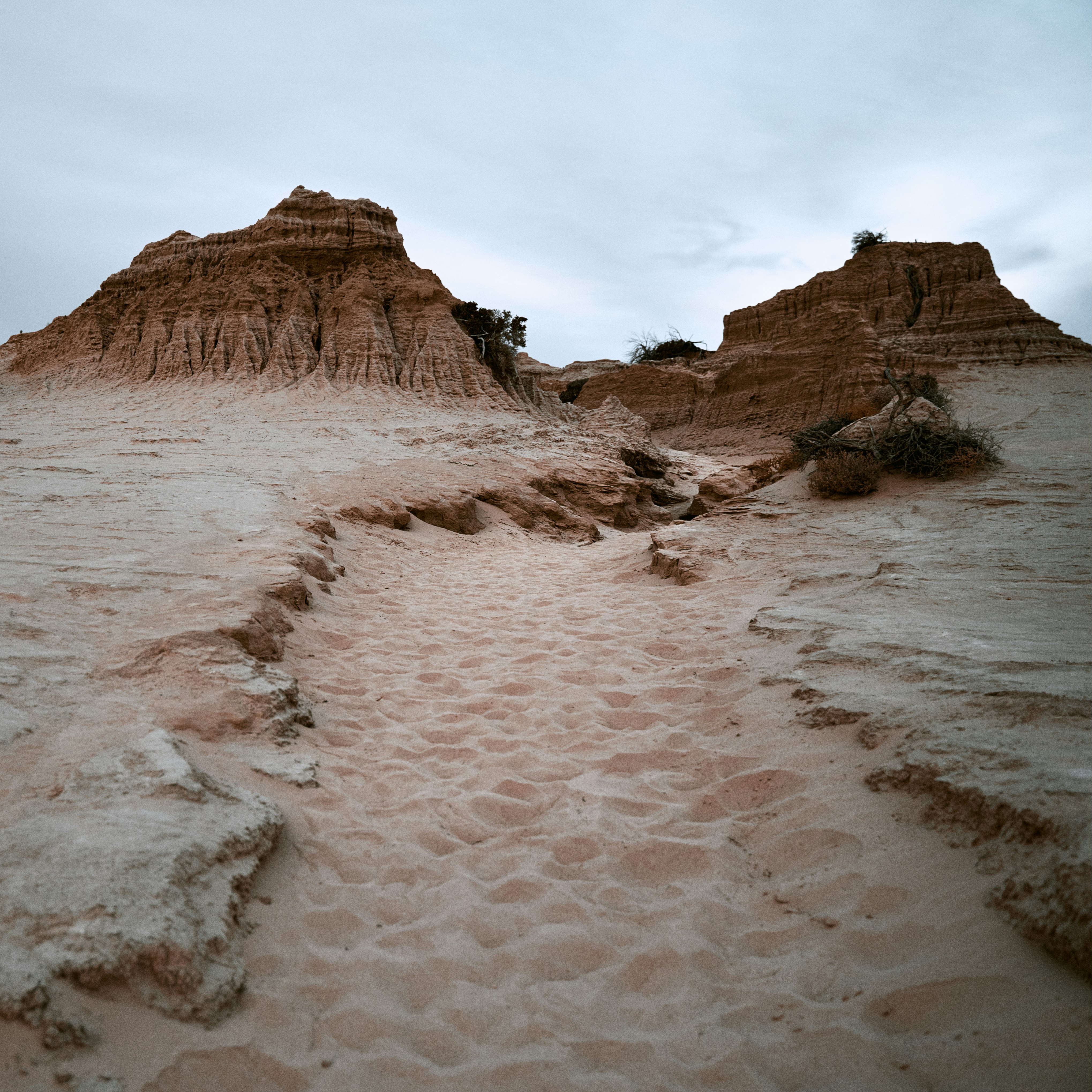 brown rocky mountain under white sky during daytime