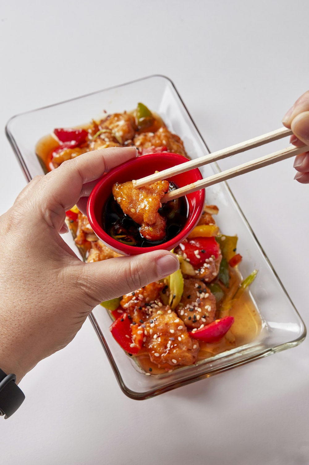 person holding stainless steel fork and knife