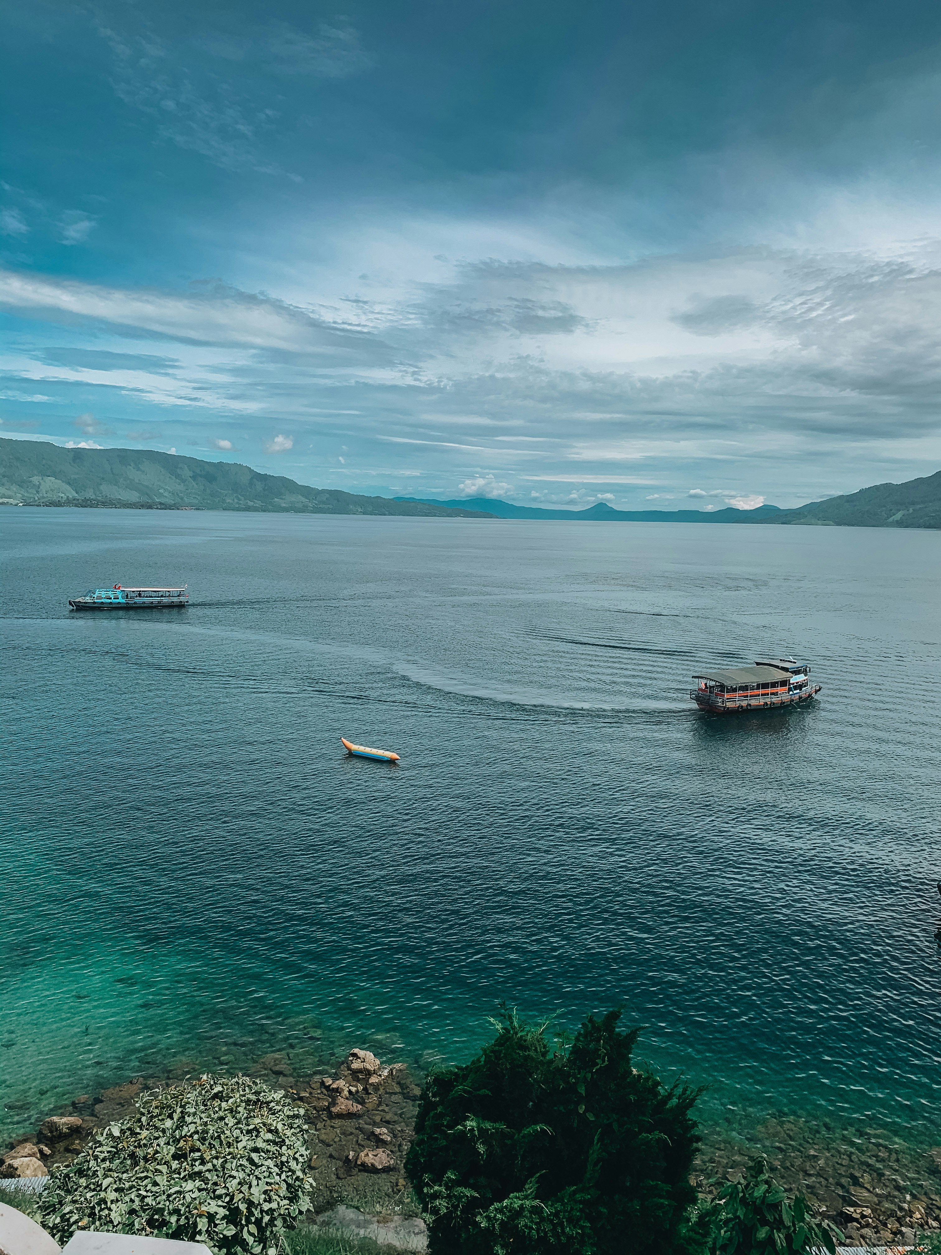 Passenger boat at toba lake, the biggest lake in southeast asia, indonesia