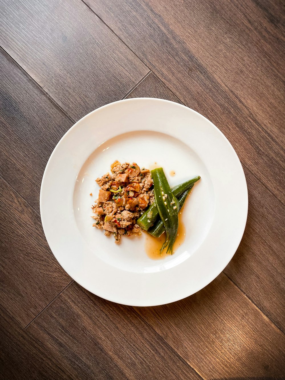 green vegetable on white ceramic plate