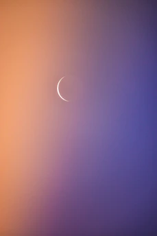 A peaceful meditation scene with soft gradients and subtle moon motifs in the background.