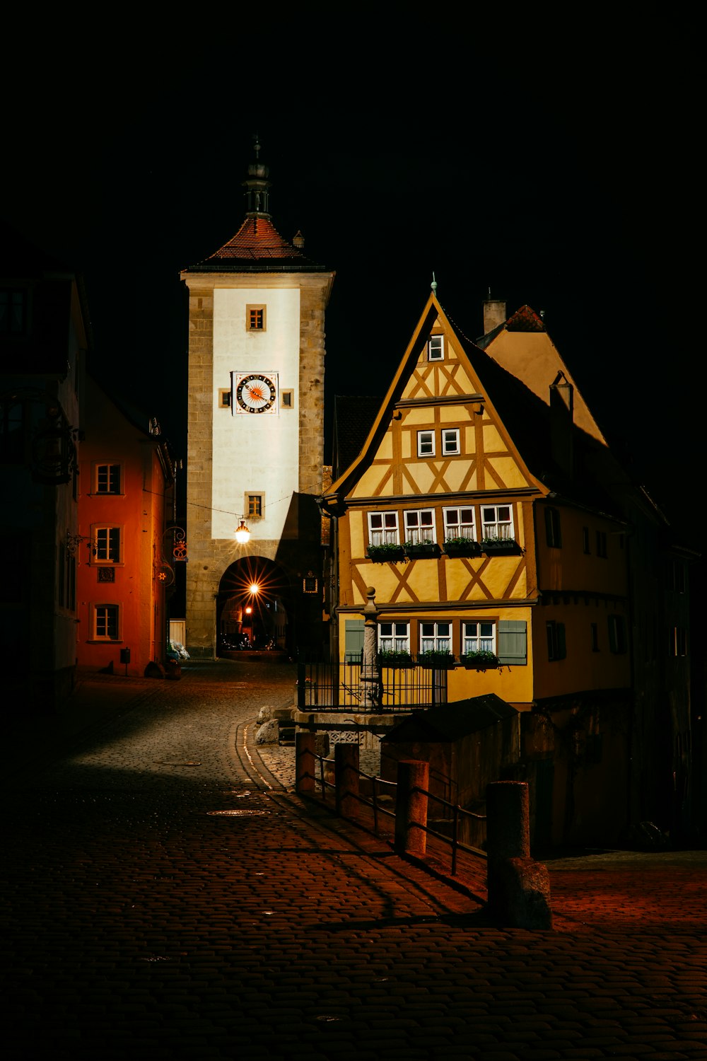 a tall building with a clock on the side of it