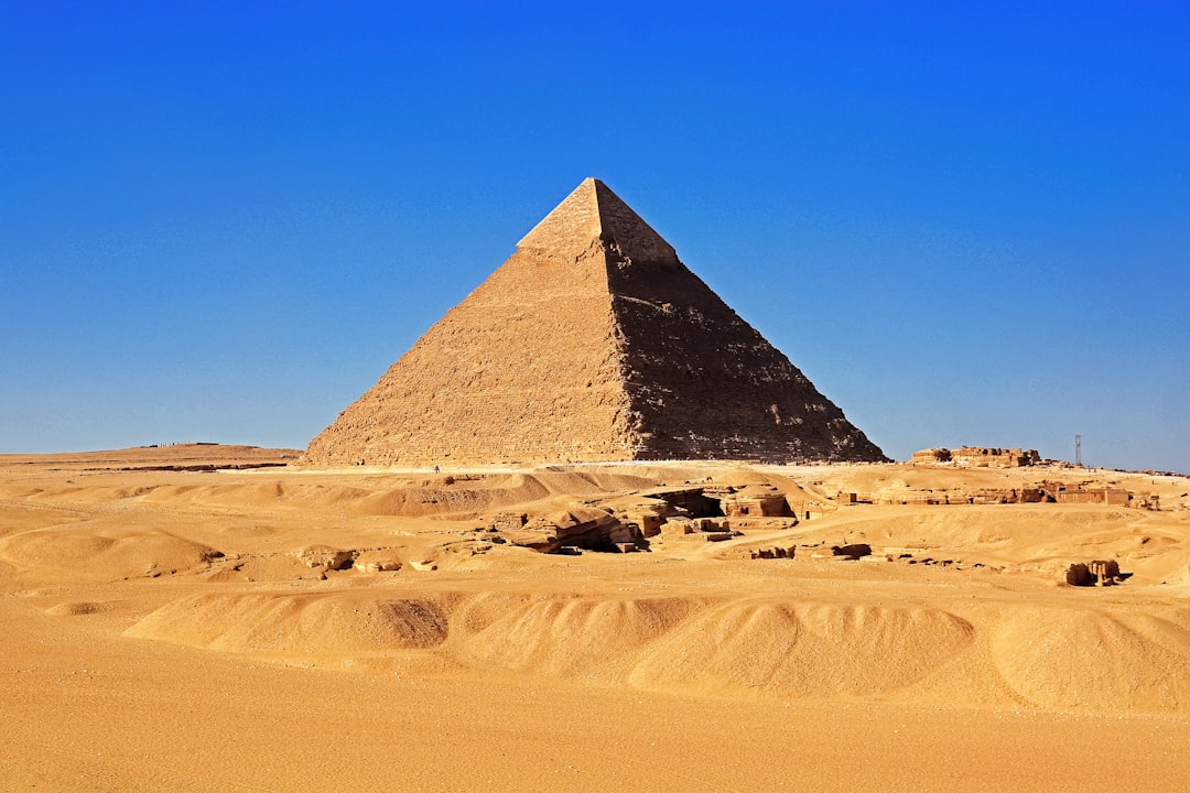 pyramid on desert during daytime