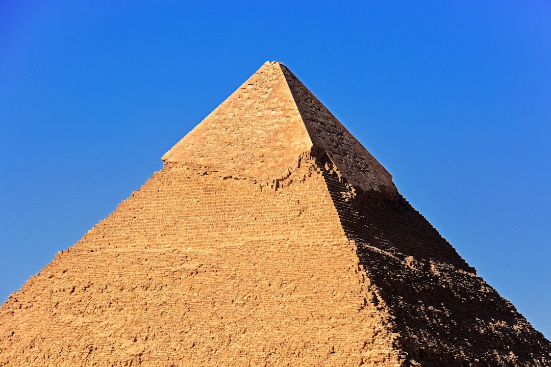 brown pyramid under blue sky during daytime