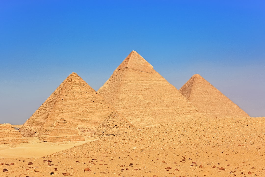 pyramid of giza under blue sky during daytime